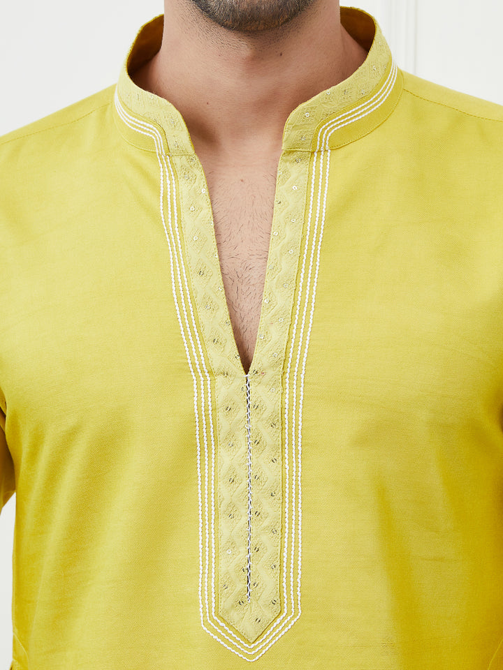 Solid Pure Cotton Straight Kurta with Embroidered Sequin and Thread worked Neck Design