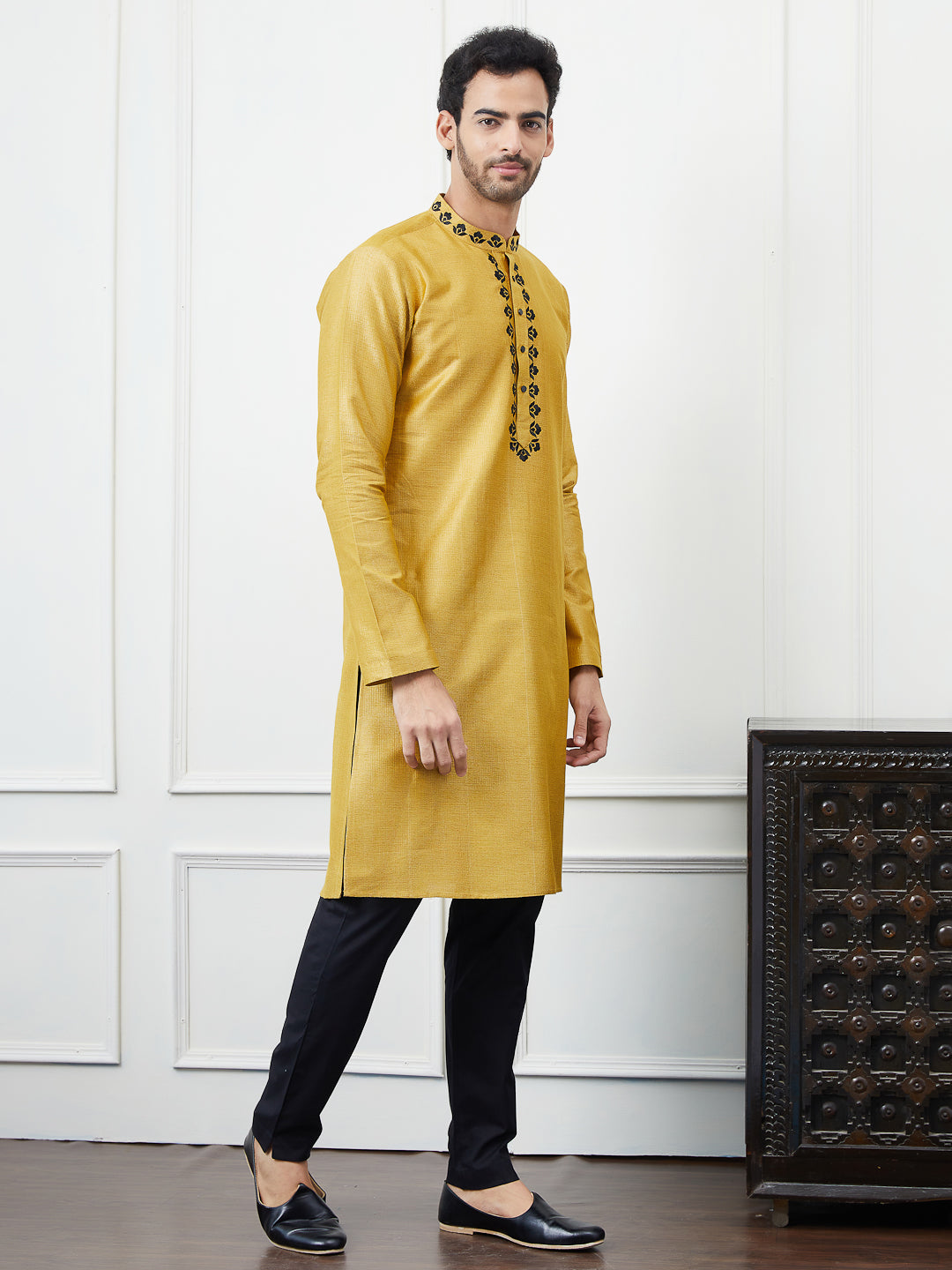 Solid Pure Cotton Straight Kurta with Embroidered Neck Design